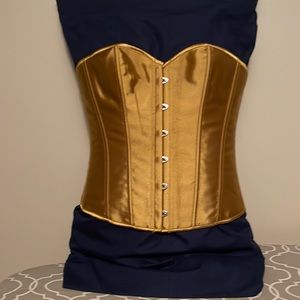 Gold corset. Size on garment tab misleading. Fits like an XL. Chicastic